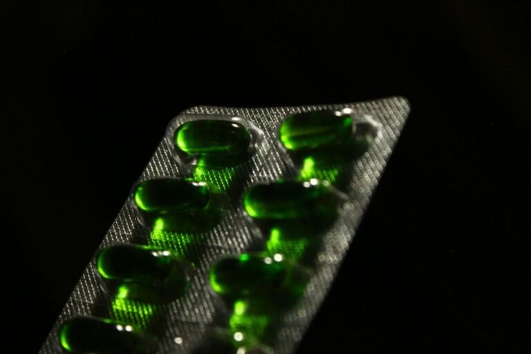green medication pill in blister pack